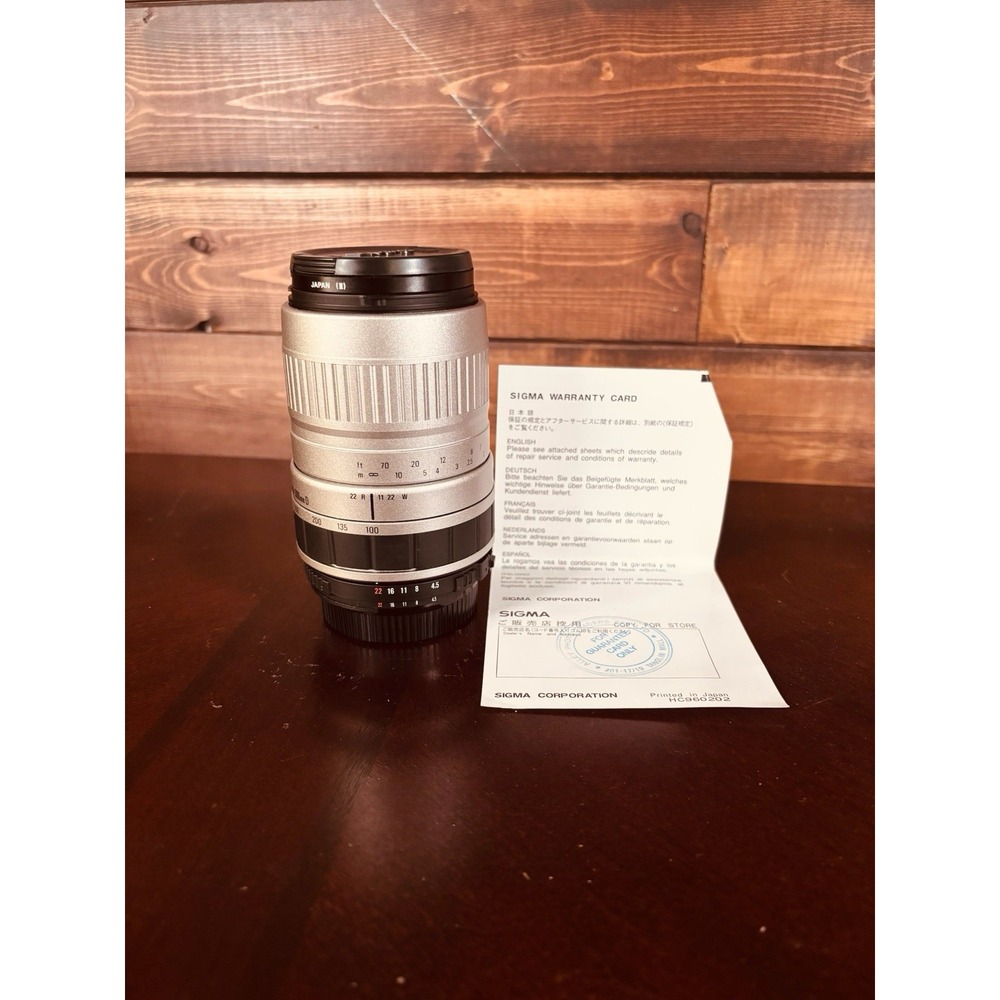 Sigma 100-300mm F/4.5-6.7 DL. w/55mm UV Filter Lens